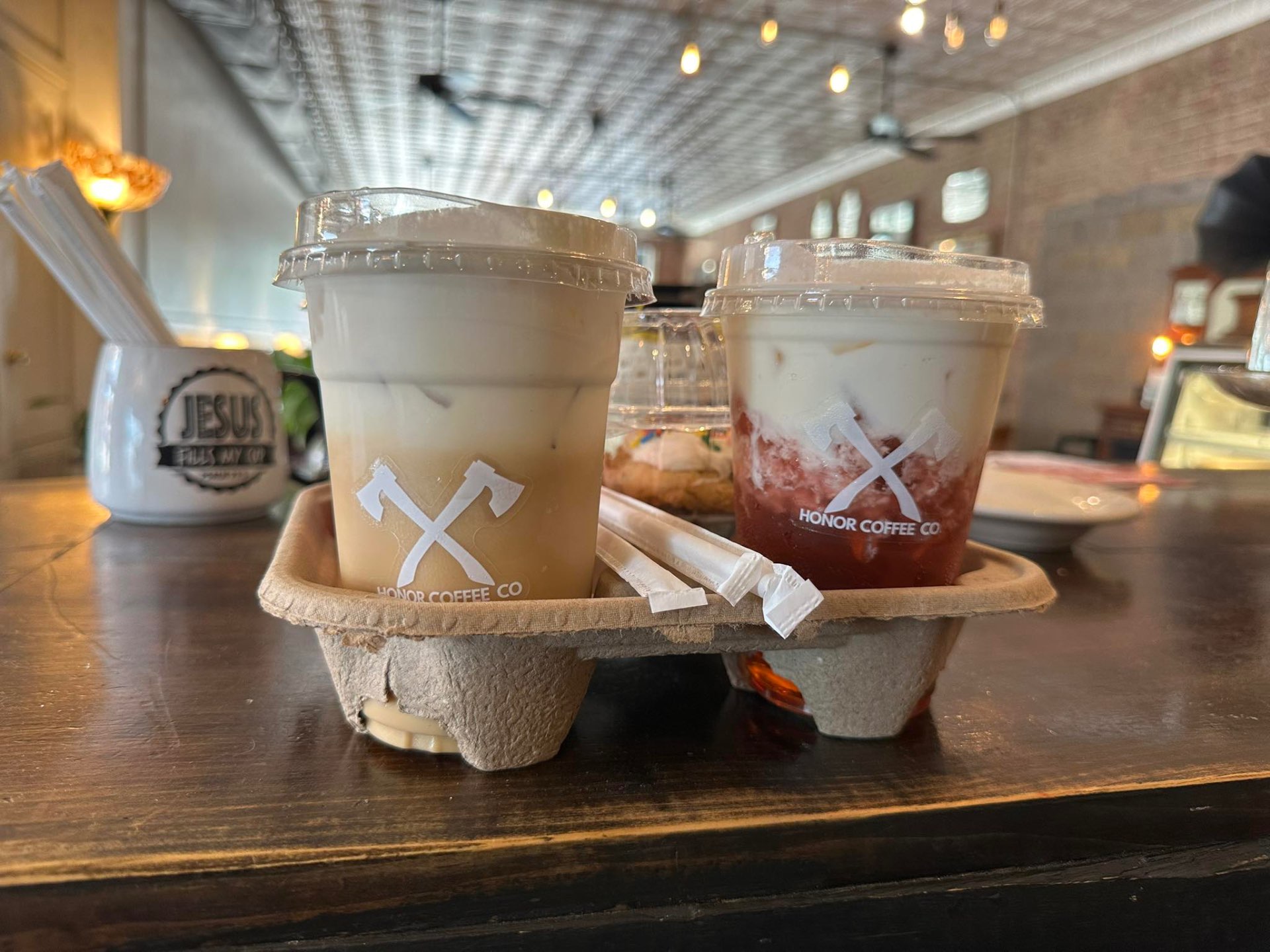 Espresso being poured into a ceramic cup